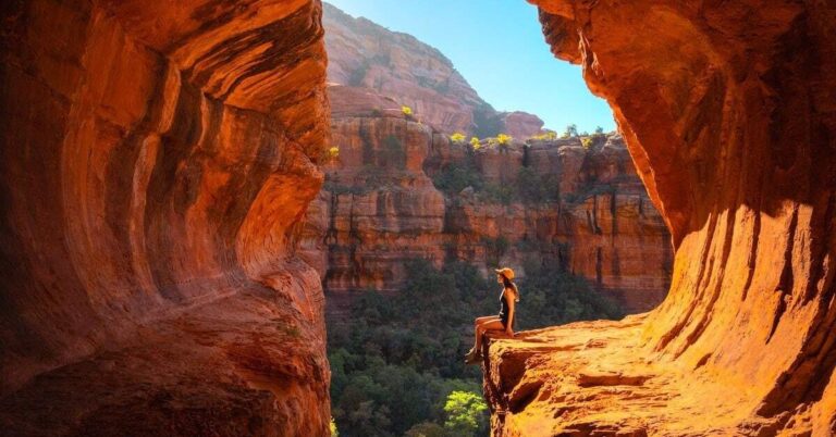Breathtaking view of Sedona hiking trails with red rock formations and waterfalls, perfect for outdoor adventurers.